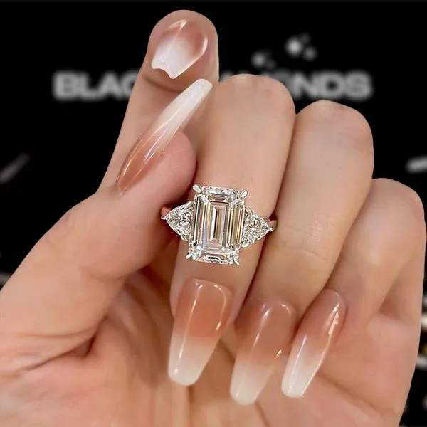 Emerald Cut White Sapphire Three Stone Engagement Ring