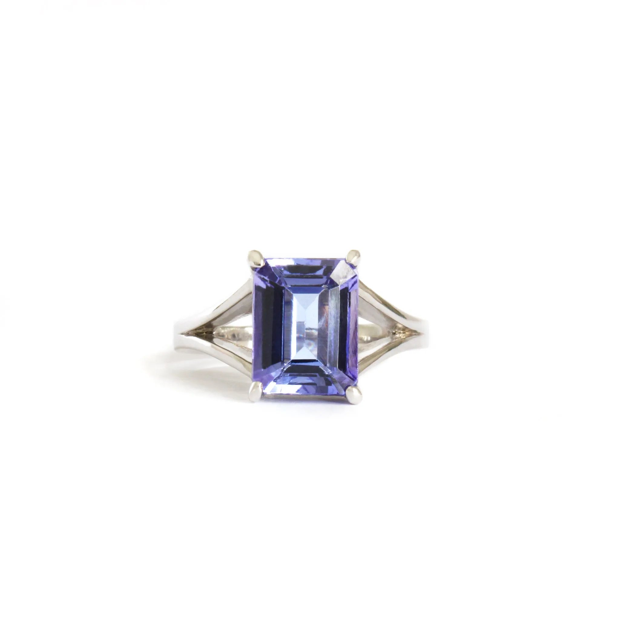 Regal Elevated Emerald Cut Tanzanite Solitaire White Gold Ring