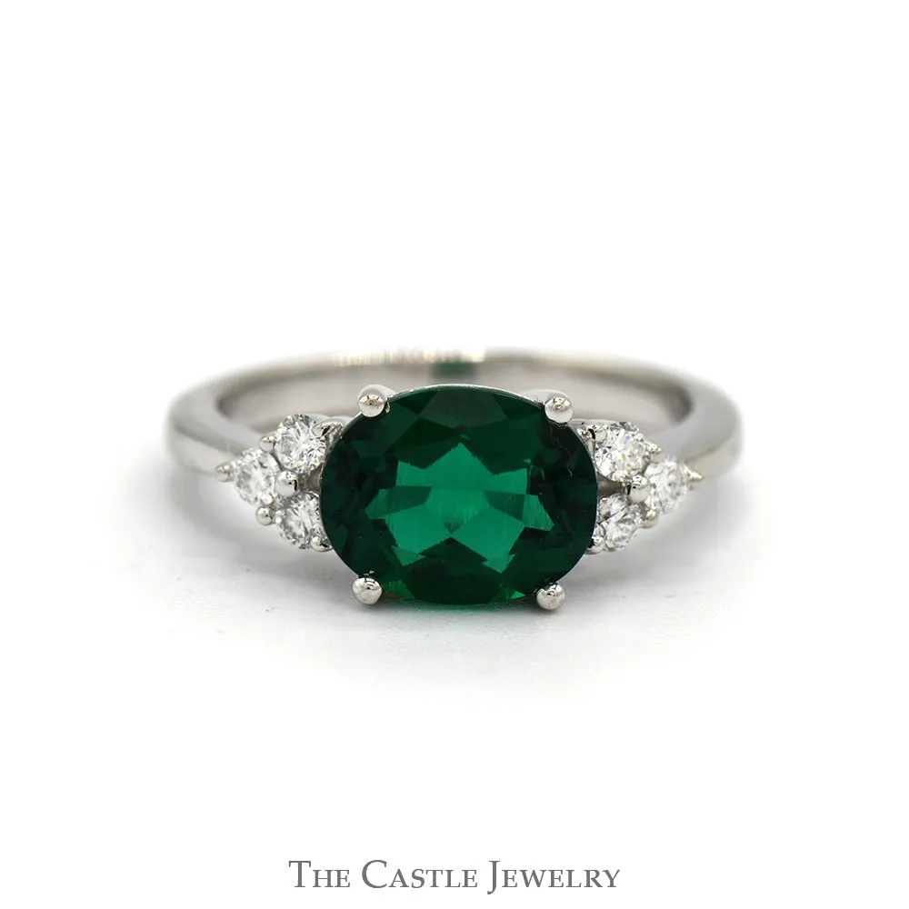 Side Set Oval Cut Lab Created Emerald Ring with Diamond Accents in 14k White Gold